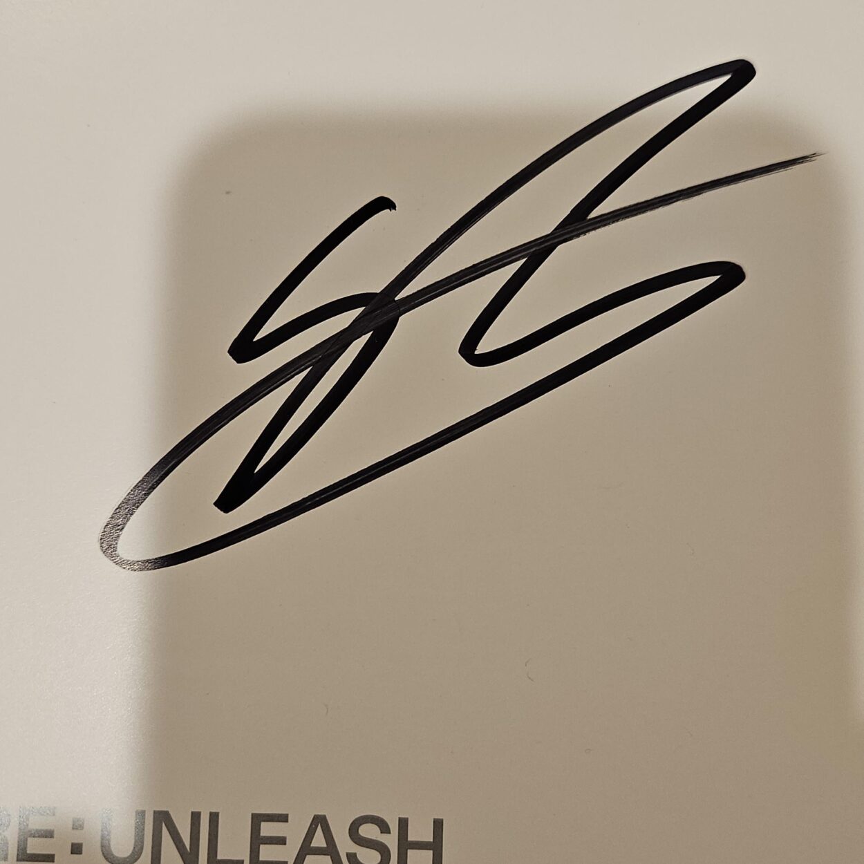 Whose signature is it?