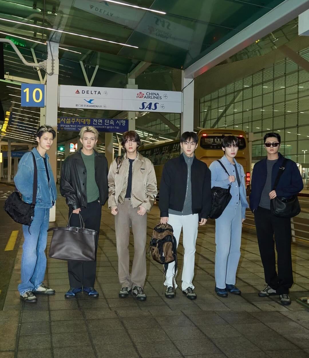 260205 ENHYPEN (minus Sunghoon) heading to Taipei for the grand opening event of the Prada store at Breeze Nan Shan [Airport Media Photos]